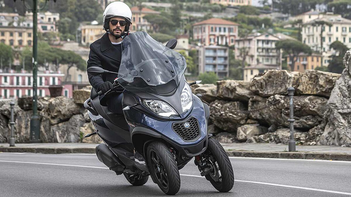 Der Dreiradroller MP3 von Piaggio – nach Auffassung der Italiener das (patentgeschützte) Original der Gattung...